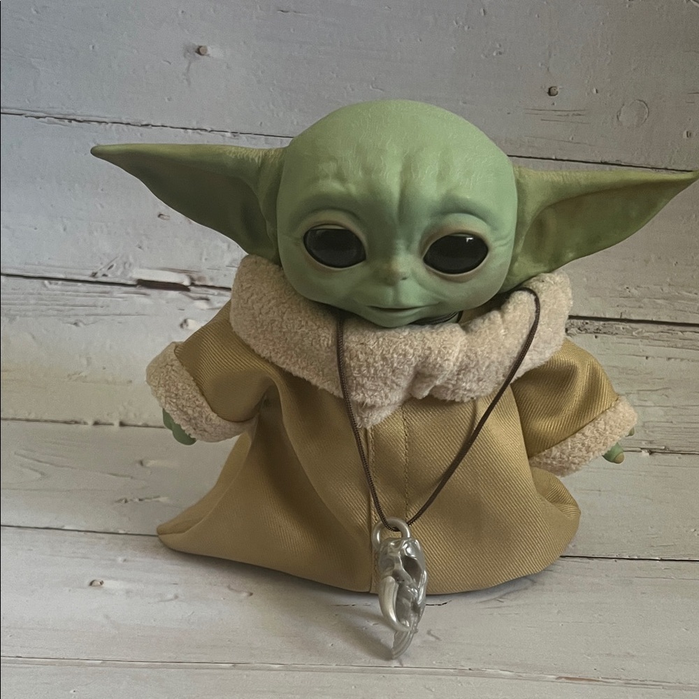 grogu Star Wars taking toy